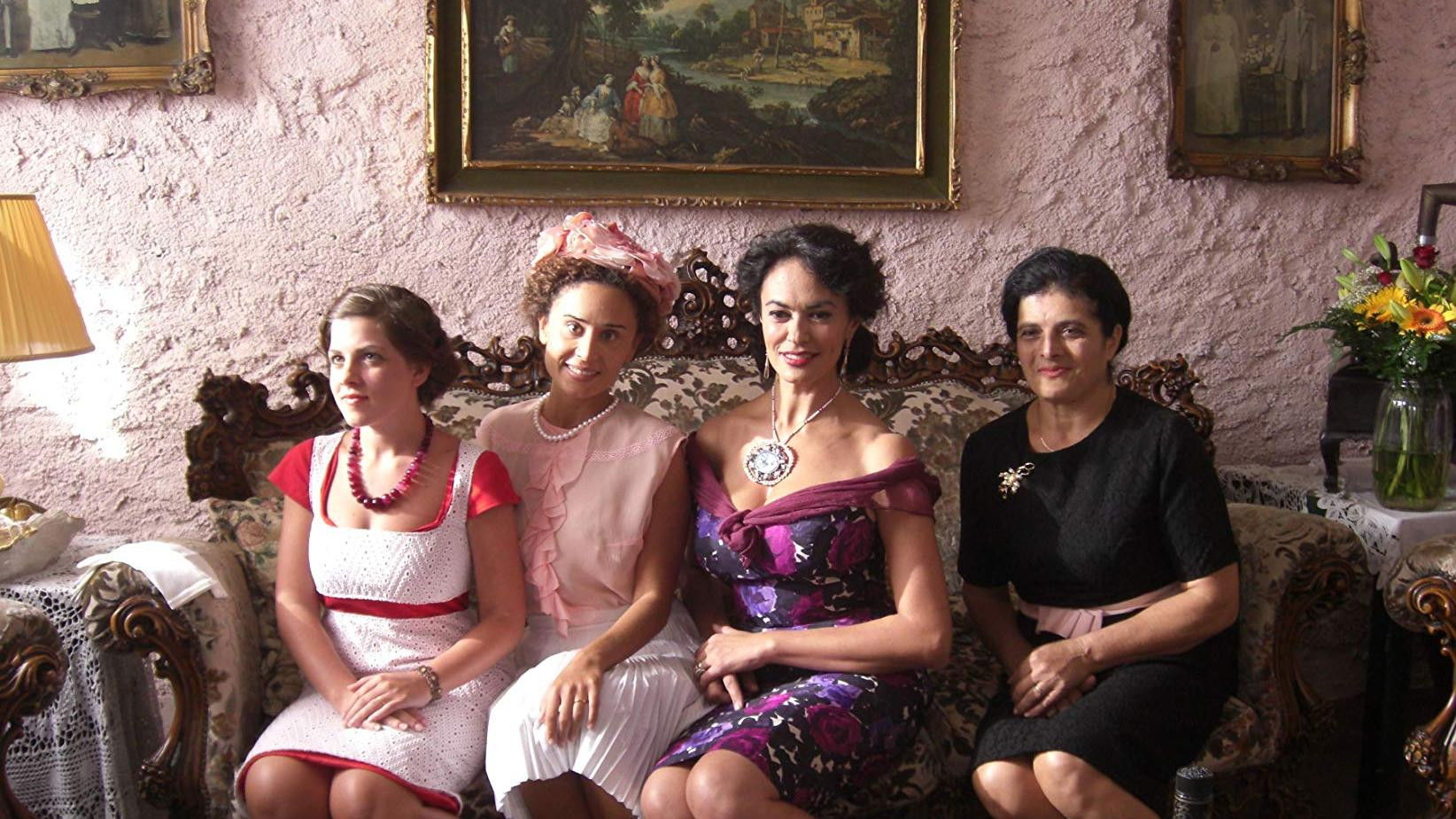 The Tailor's Wife Background