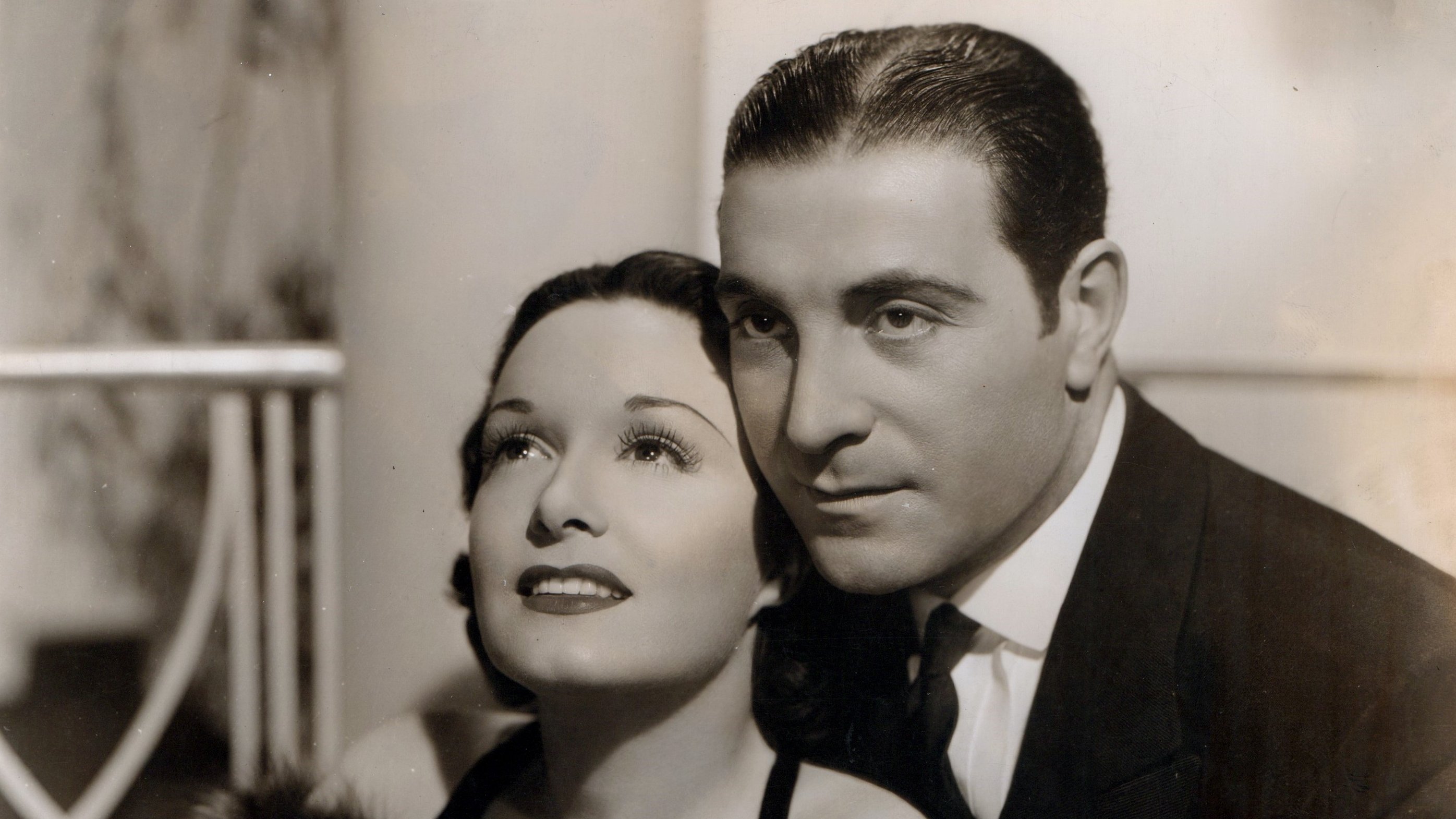 Her Husband Lies Background