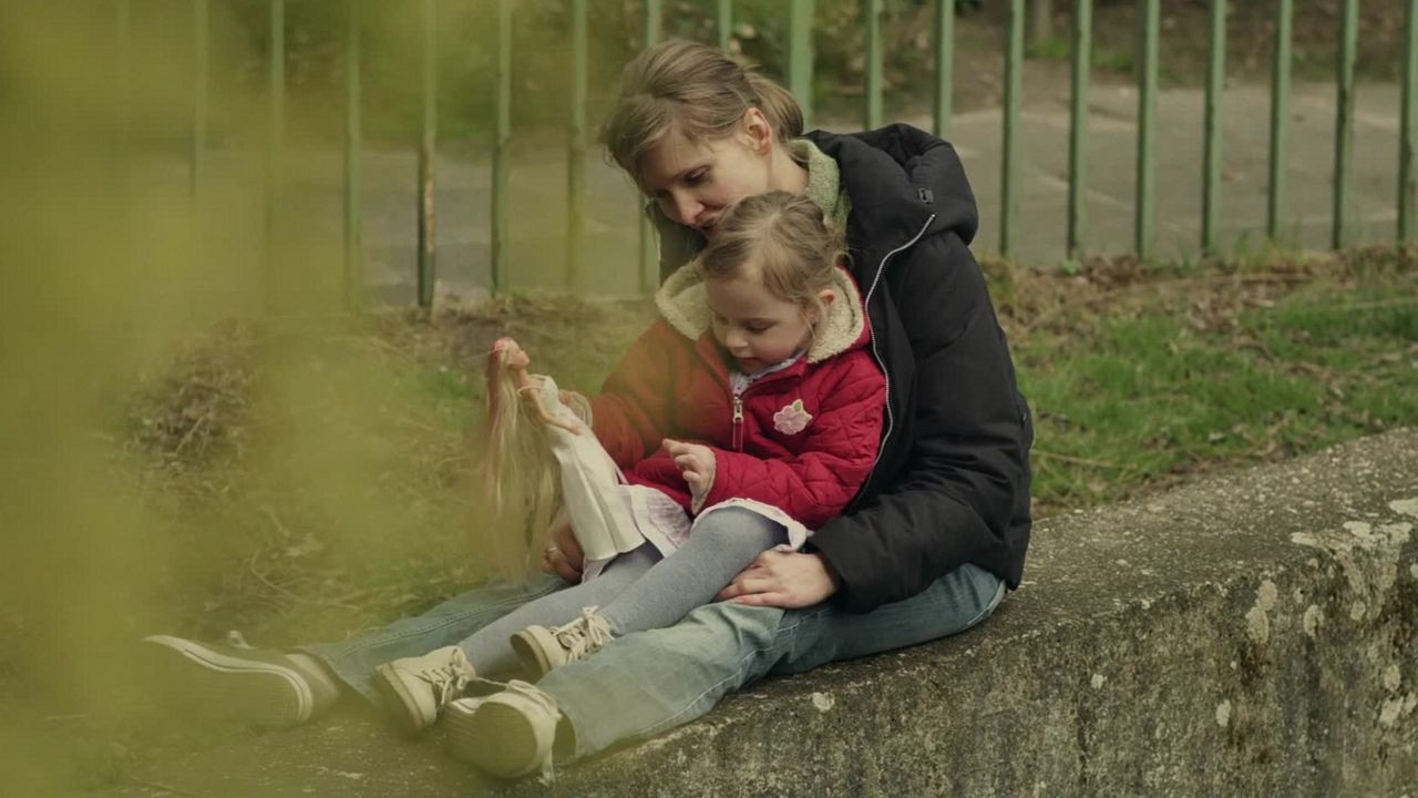 The Policeman's Wife Background