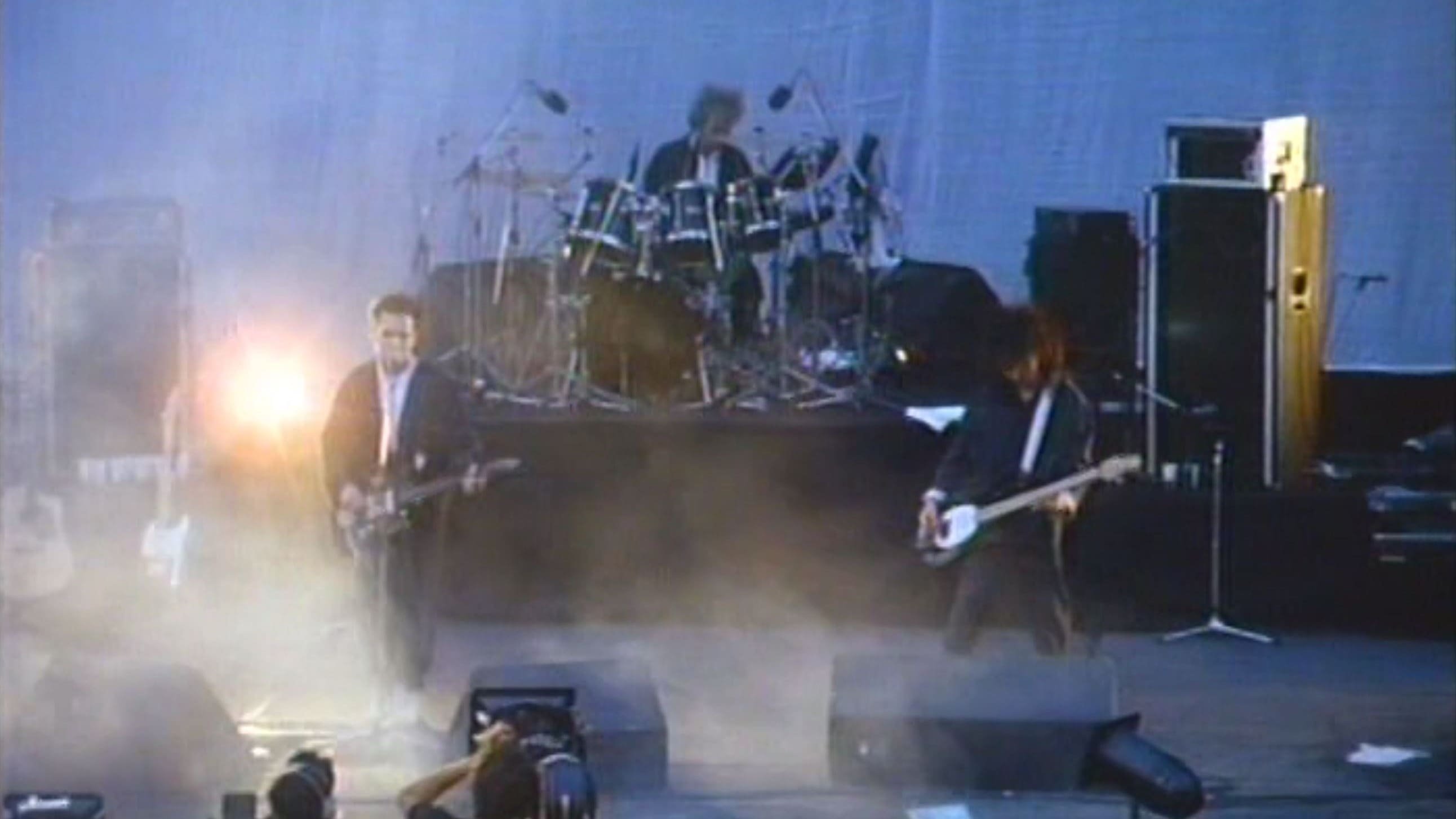 The Cure In Orange Background