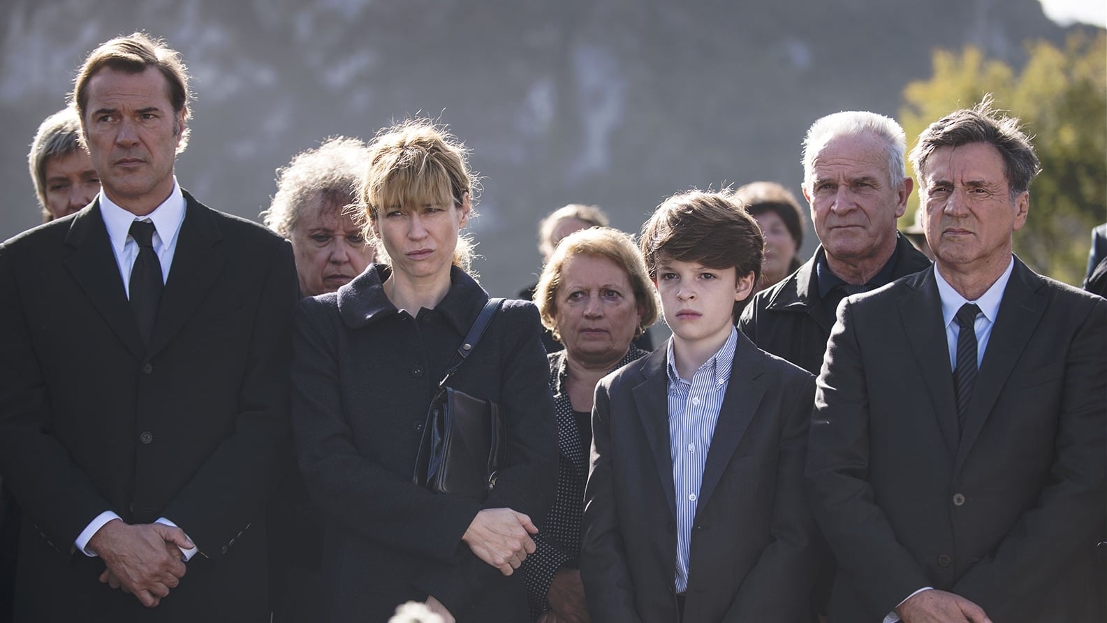 In Her Name Background