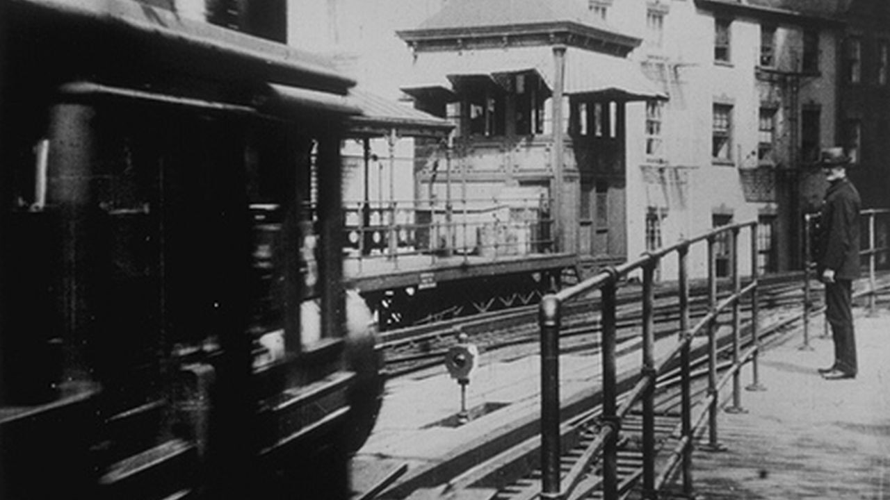 New York. Arrival of a Train at Battery Place Background