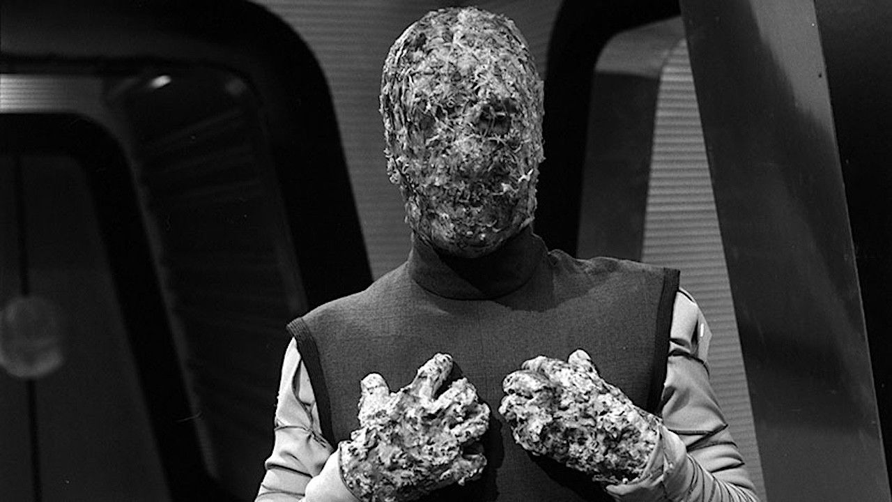 Doctor Who: The Faceless Ones Background